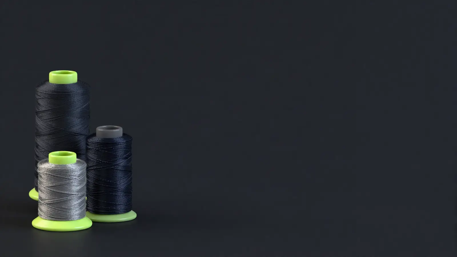 Embroidery thread spools and a stitched patch