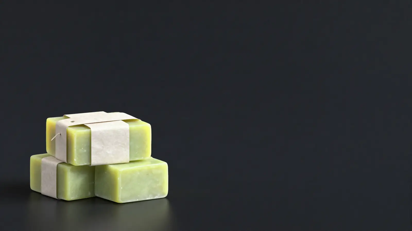 Stack of wrapped handmade soap bars with price tags