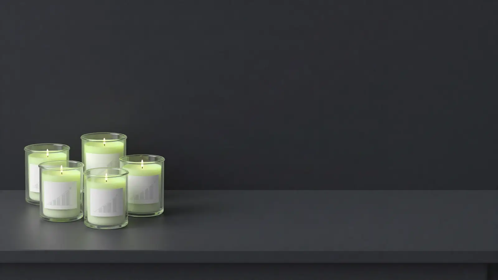 Batch of jar candles next to a rising bar chart